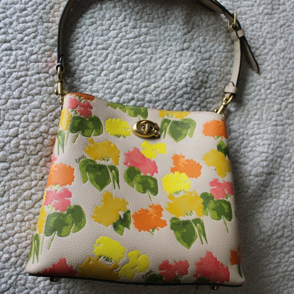 NWT  COACH purse, floral design, crossbody or hand carry bag